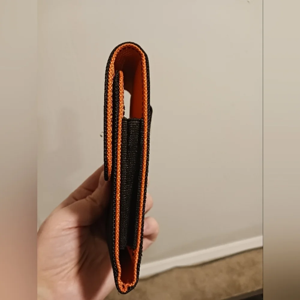 Klein Tools phone case pouch hooks belt black orange magnetic closure durable
